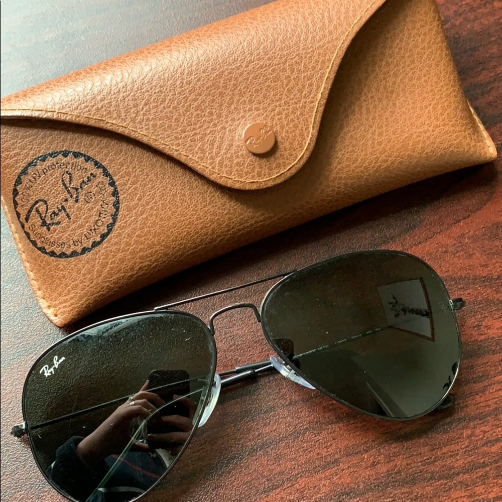 All black Ray Ban aviators